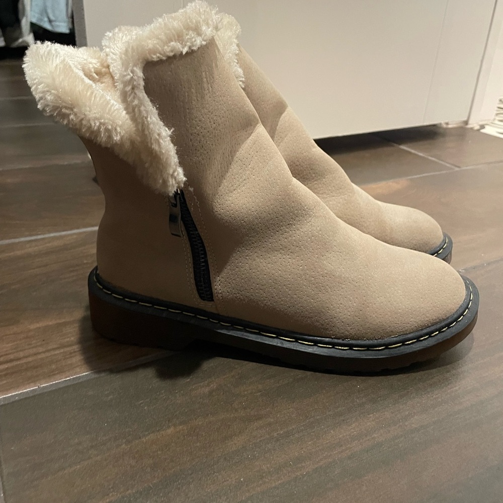 Beige, winter boots, fur lined. Sturdy and clean. Zipper closure. Lightly worn.